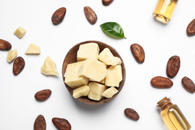 Photo of Composition with organic cocoa butter on white background, top view