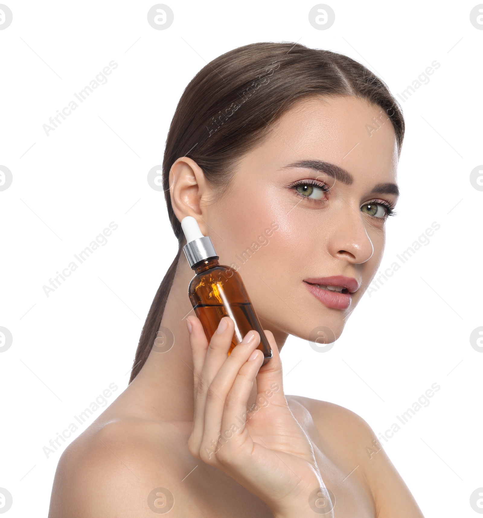 Photo of Young woman with bottle of essential oil on white background