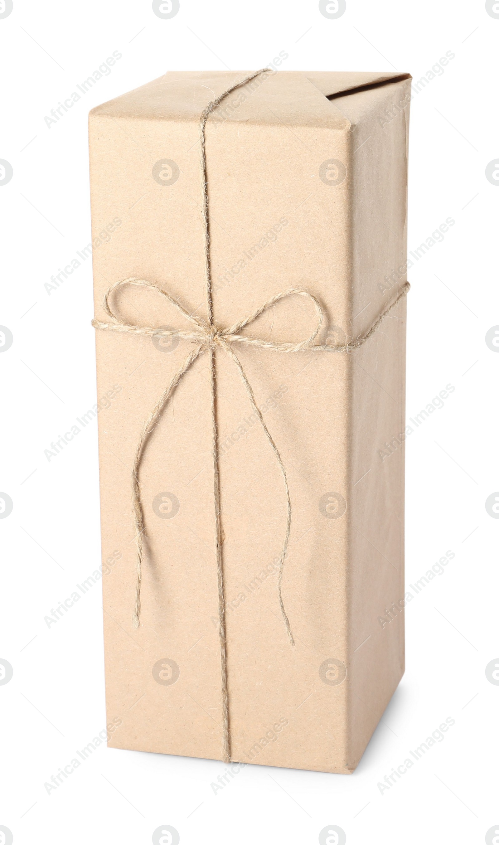 Photo of Parcel wrapped with kraft paper and twine isolated on white