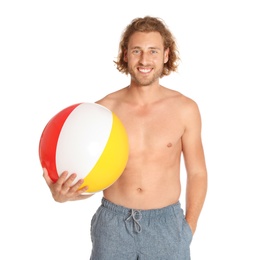 Attractive young man in beachwear with colorful inflatable ball on white background