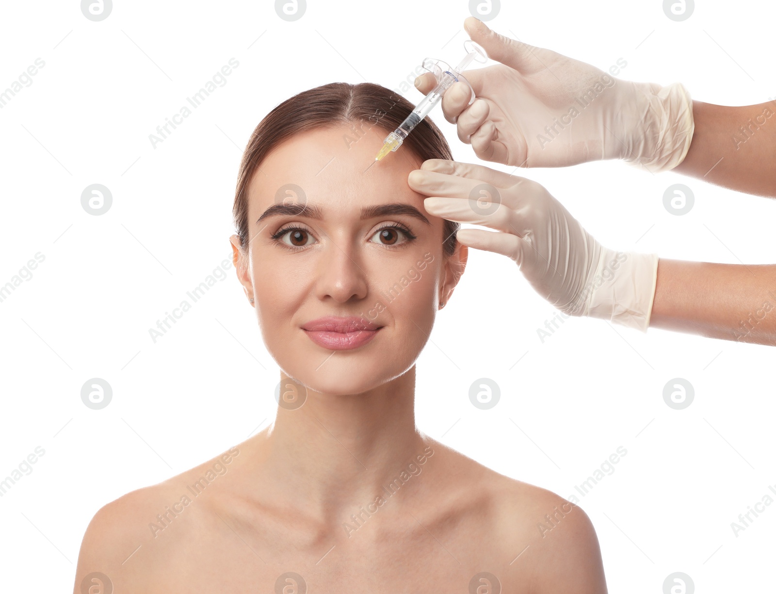 Photo of Beautiful woman getting facial injection on white background. Cosmetic surgery