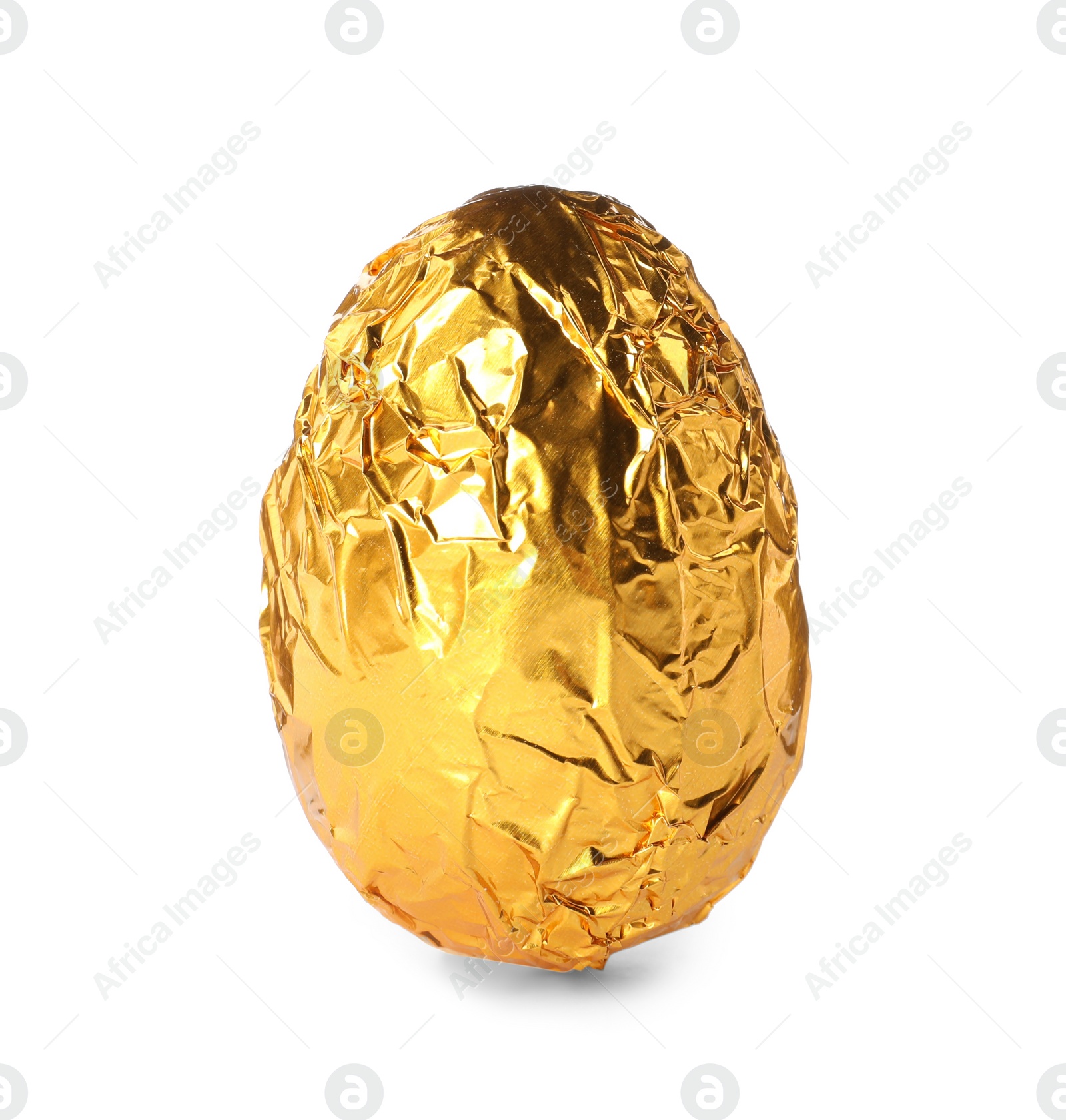 Photo of Chocolate egg wrapped in golden foil isolated on white