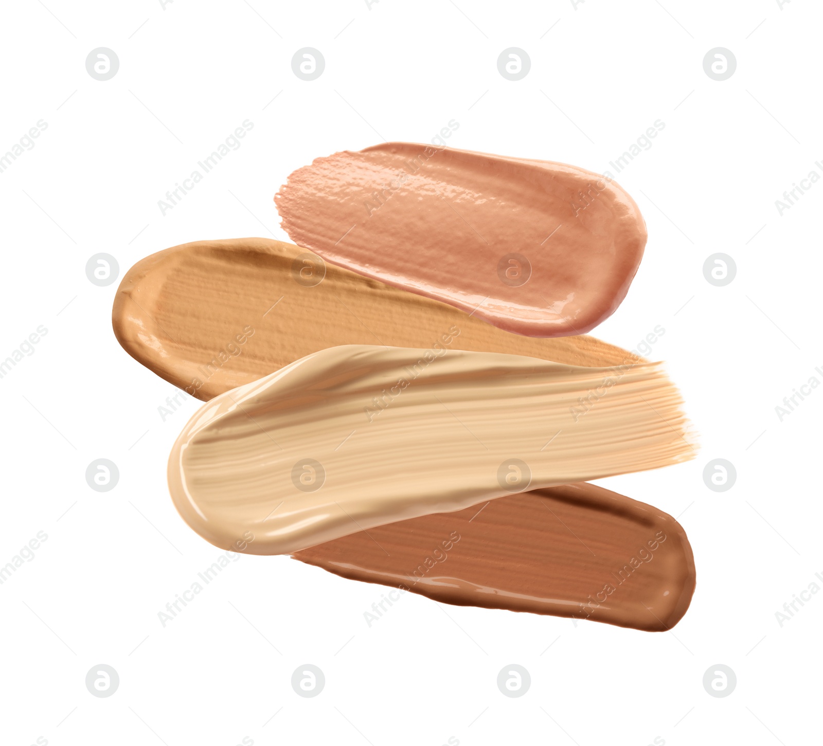 Image of Different shades of liquid skin foundation on white background, top view