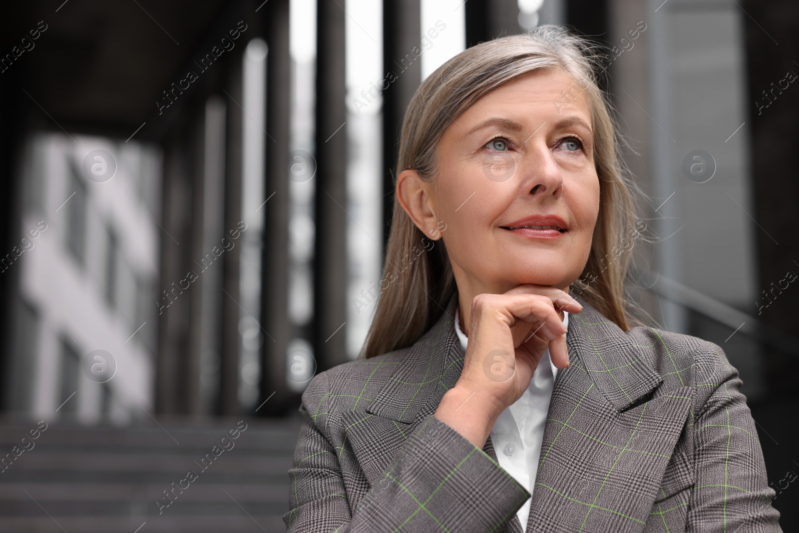 Photo of Portrait of beautiful woman outdoors, space for text. Lawyer, businesswoman, accountant or manager