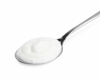 Photo of Delicious natural yogurt in spoon isolated on white