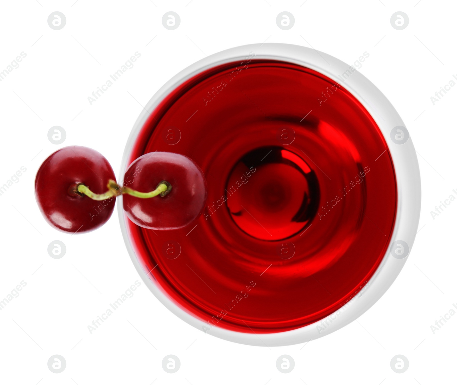 Photo of Delicious cherry wine with ripe juicy berries isolated on white, top view