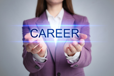 Image of Career concept. Woman on light grey background, closeup