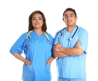Photo of Portrait of Hispanic doctors isolated on white. Medical staff