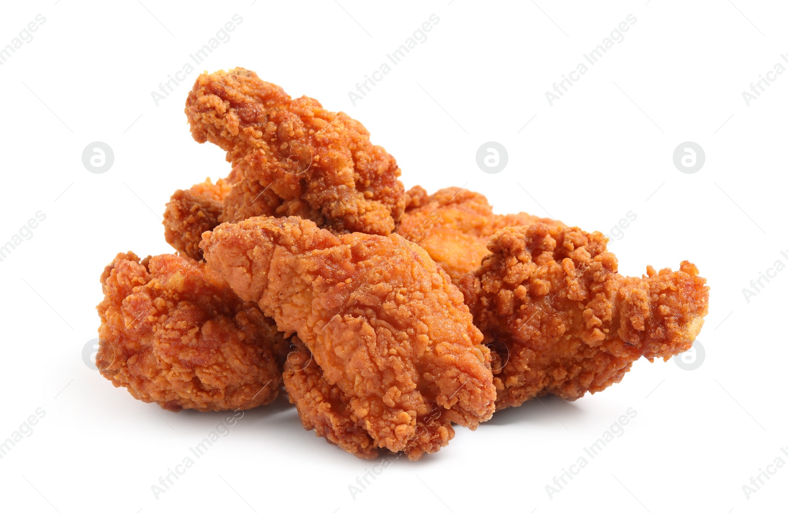 Photo of Tasty deep fried chicken pieces isolated on white