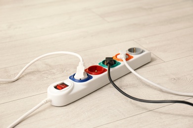 Extension cord on floor. Electrician's professional equipment