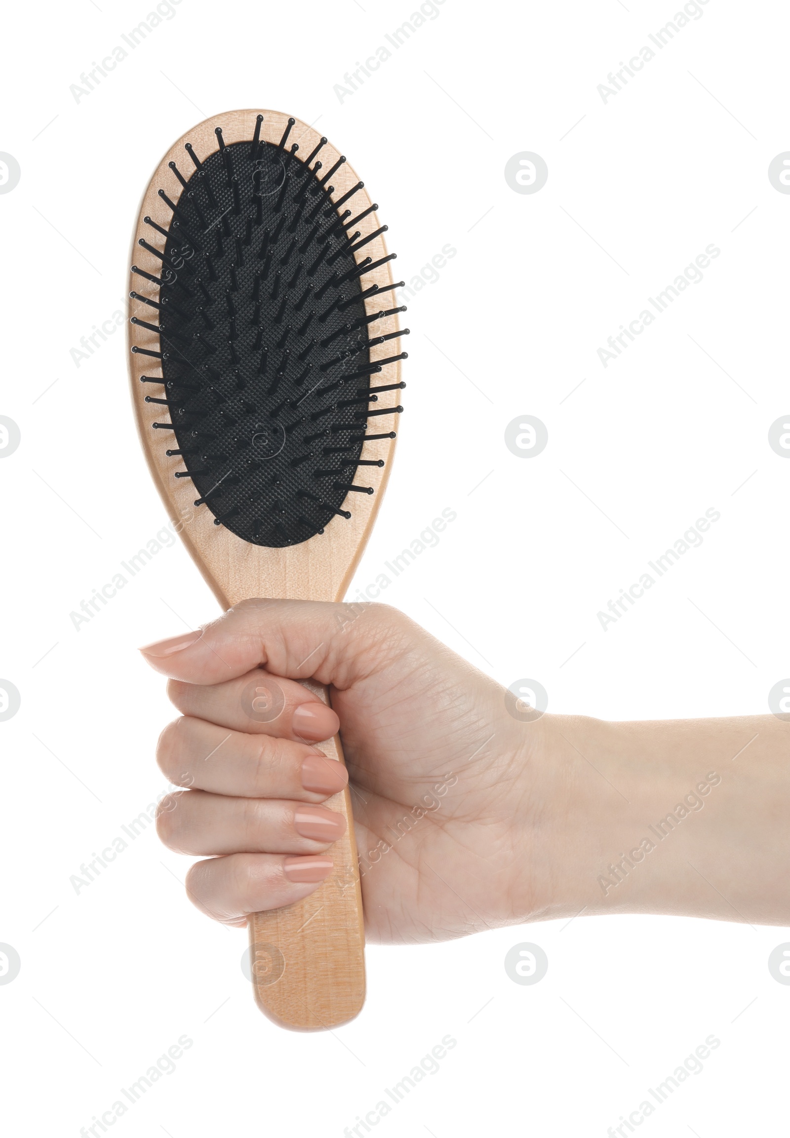 Photo of Woman holding wooden hair brush on white background, closeup