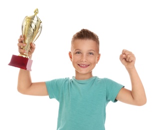 Photo of Happy boy with golden winning cup isolated on white