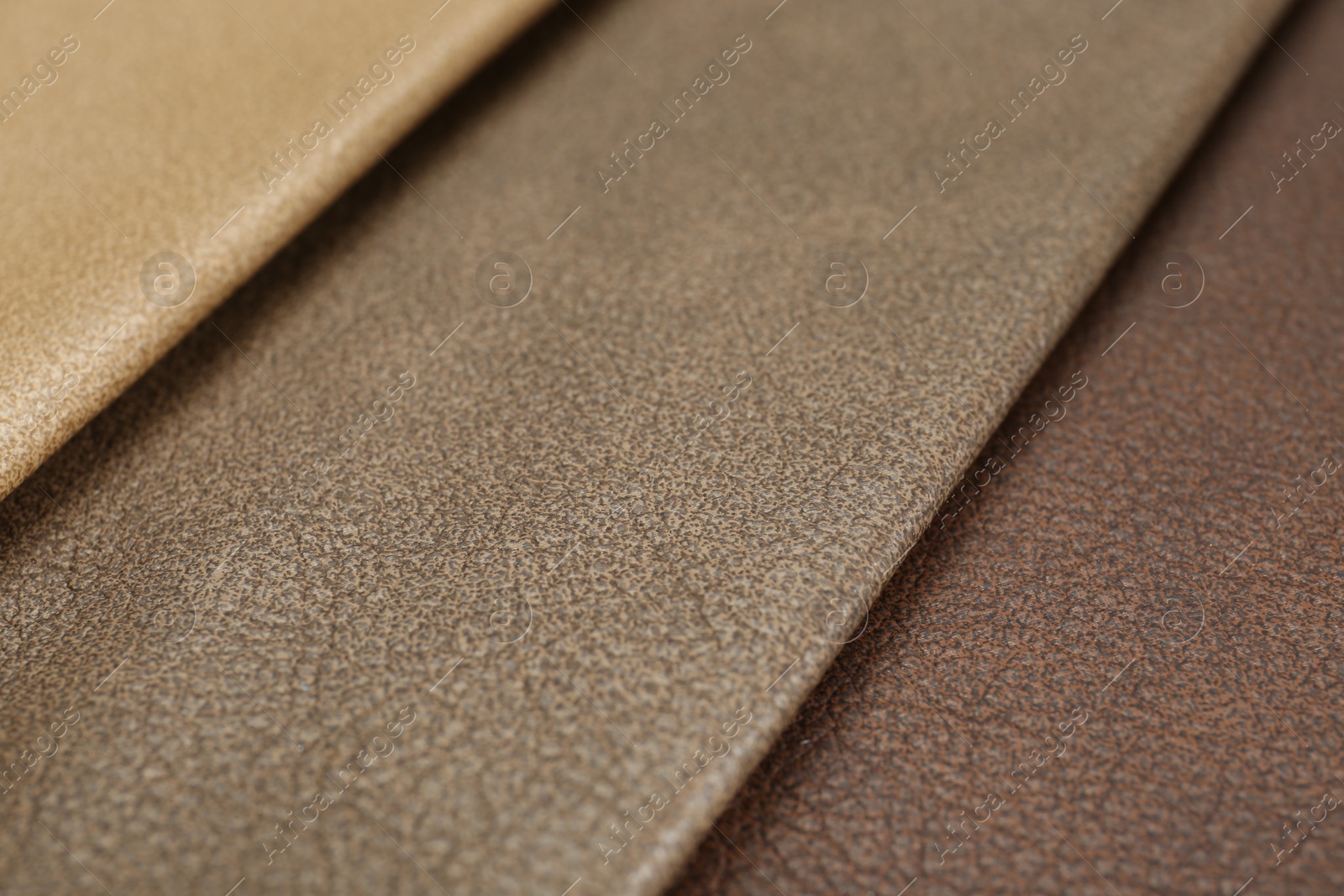 Photo of Different natural types of leather as background, closeup view