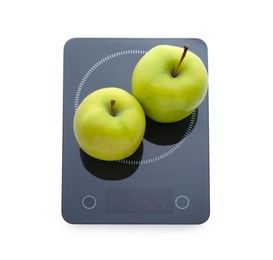 Photo of Modern kitchen scale with fresh green apples isolated on white