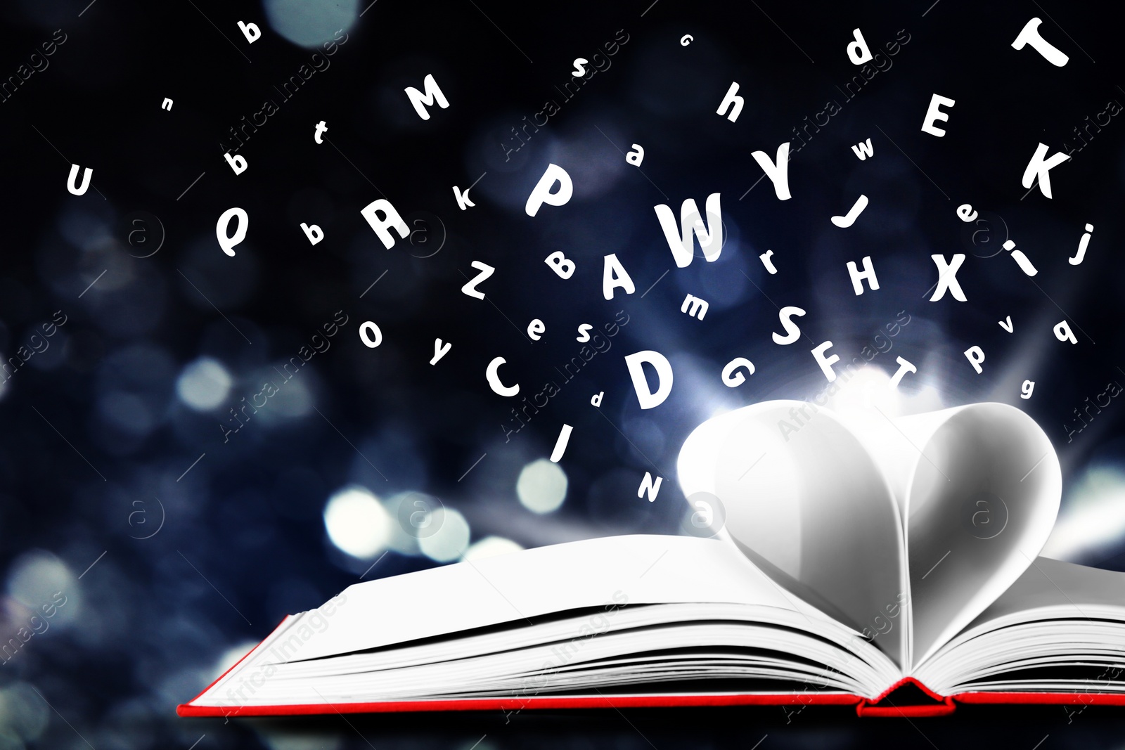 Image of Letters flying out from open book on dark background, closeup. Bokeh effect