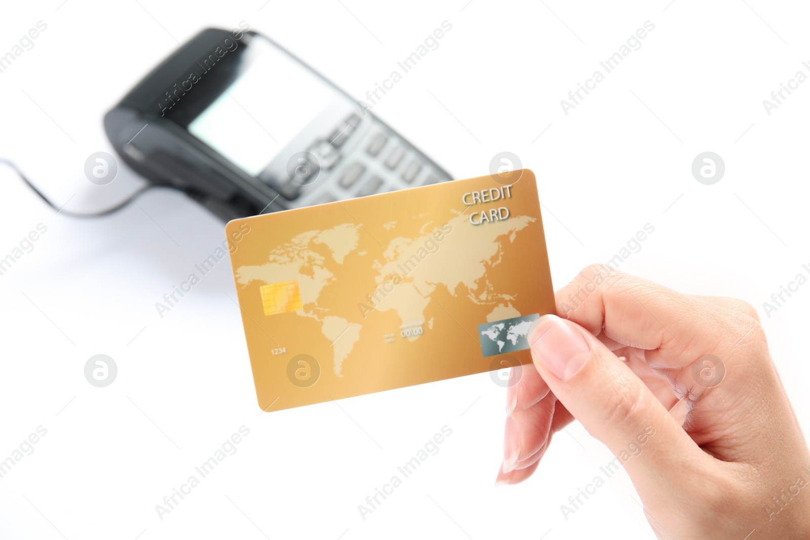 Photo of Woman with credit card and blurred payment terminal on background