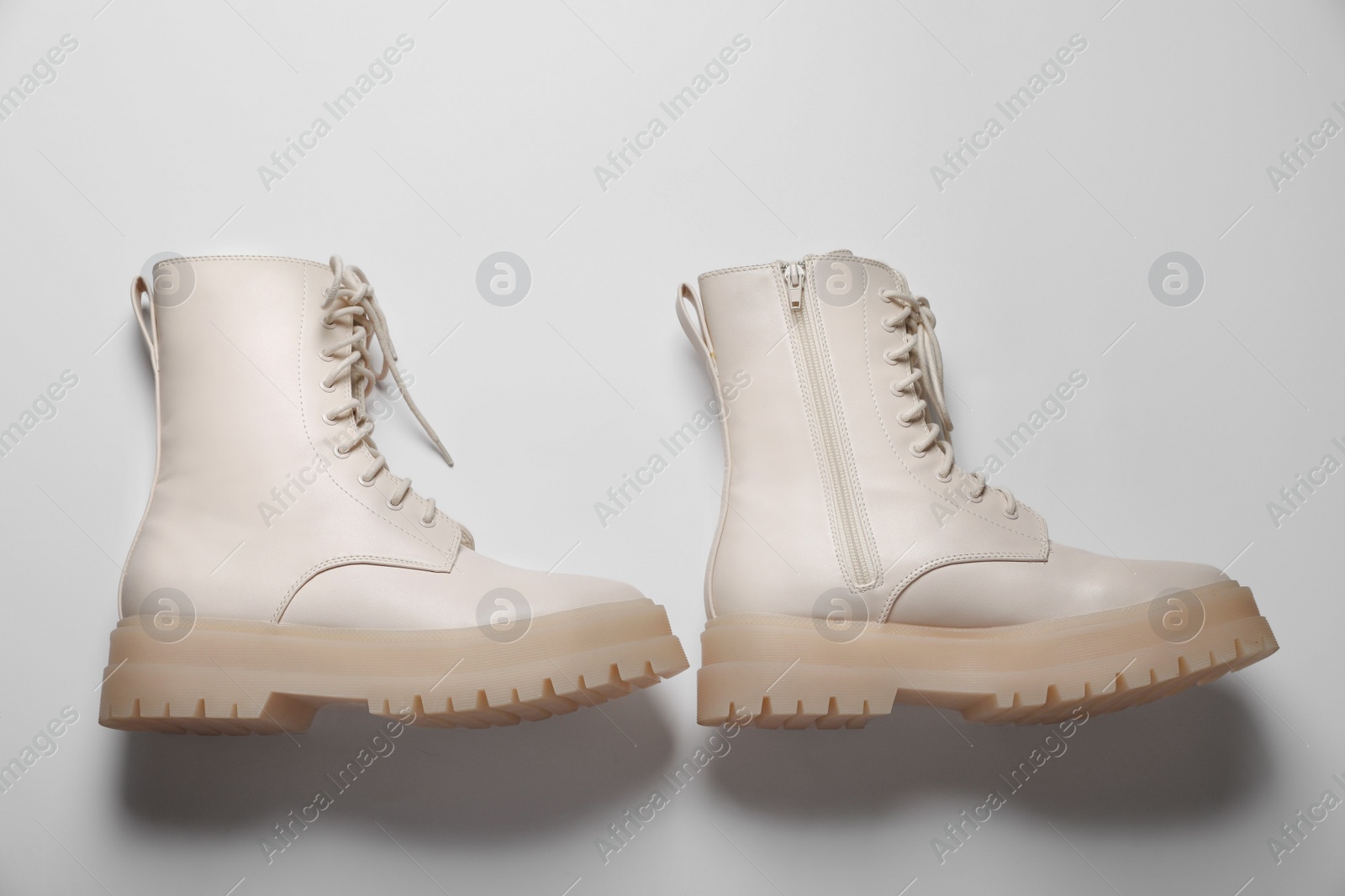 Photo of Pair of stylish leather shoes on white background, flat lay