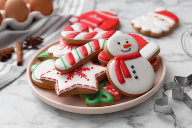 Delicious homemade Christmas cookies on white marble table