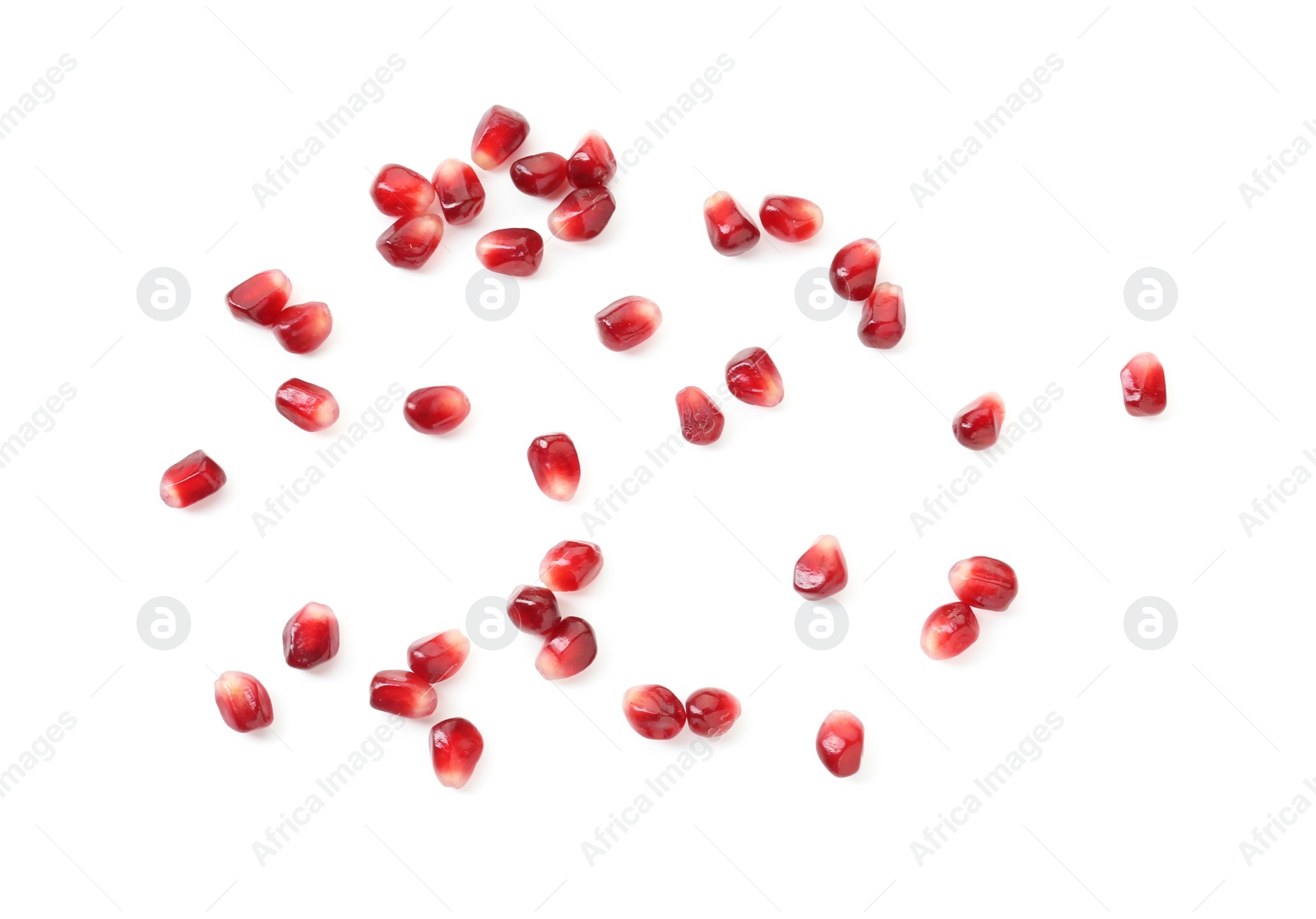 Photo of Ripe juicy pomegranate grains isolated on white, top view