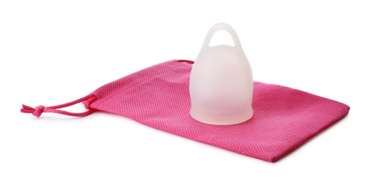 Photo of Silicone menstrual cup with pink bag on white background