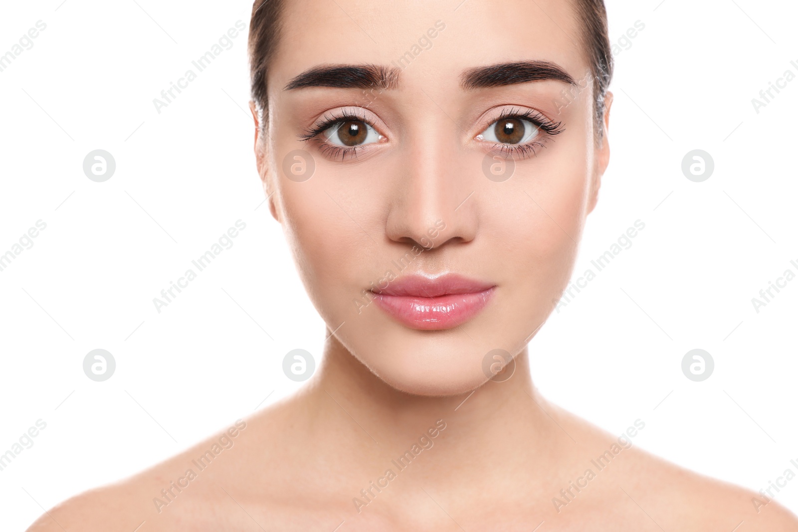 Photo of Portrait of young woman with beautiful face against white background