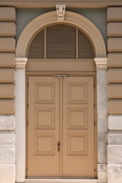 View of building with beautiful wooden door