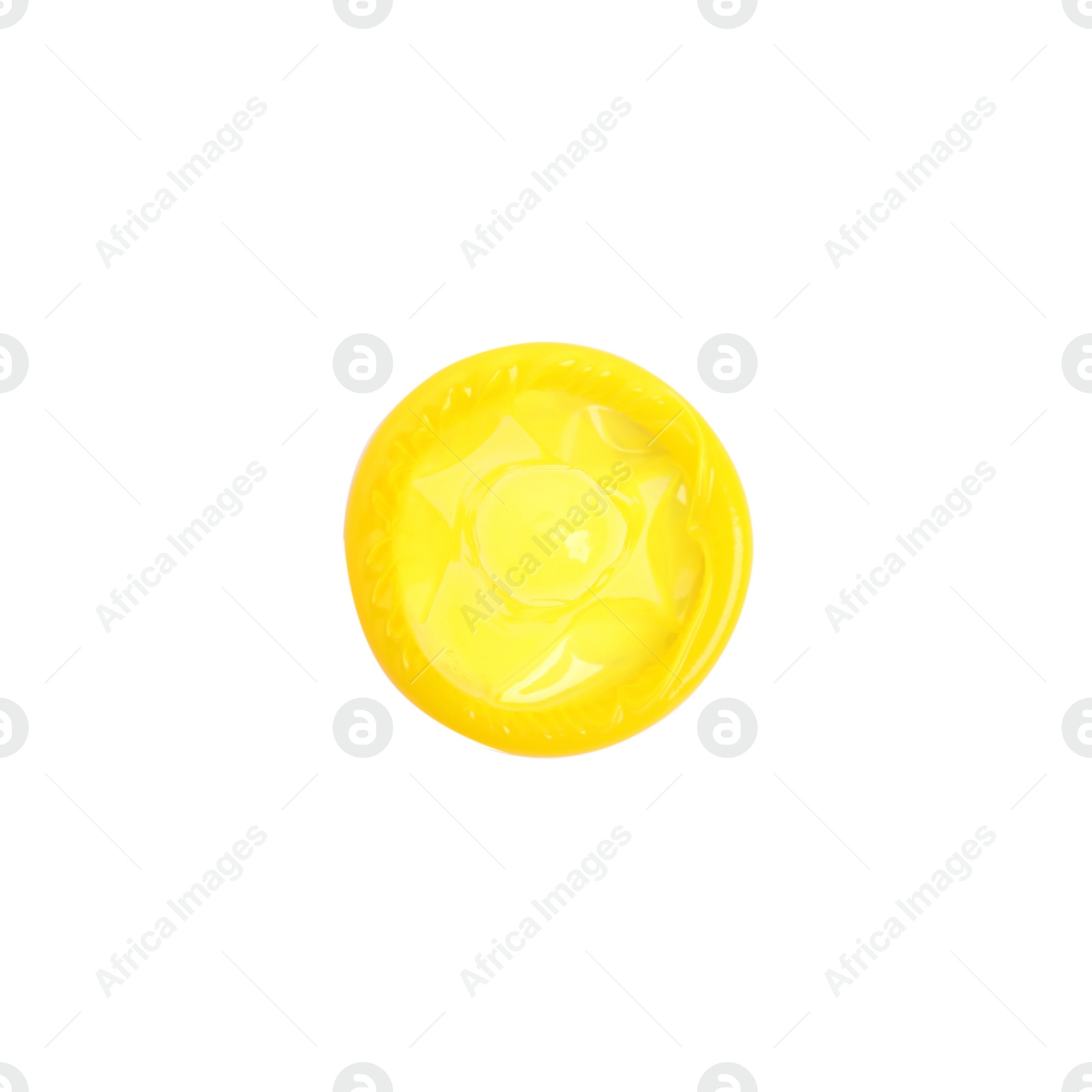 Photo of Unpacked yellow condom isolated on white, top view. Safe sex