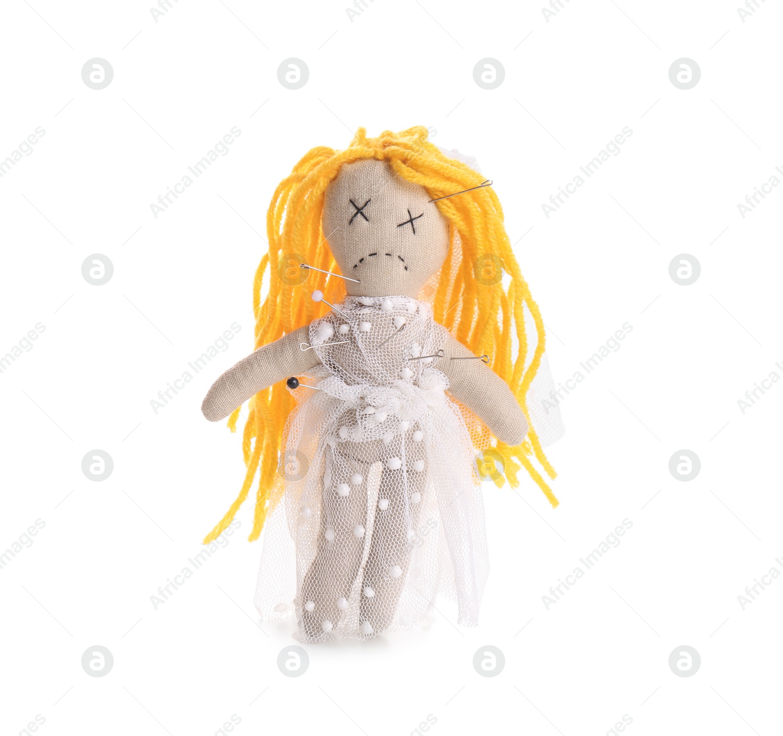 Photo of Woman stabbing voodoo doll with pin on white background, closeup. Curse ceremony