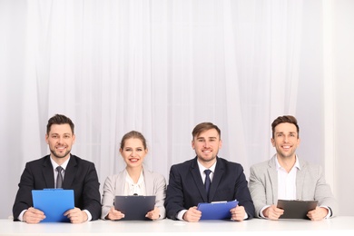 Photo of Human resources commission ready to conduct job interview, indoors