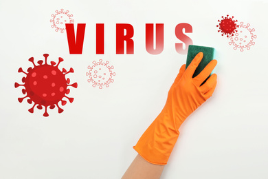 Cleaning vs viruses. Woman washing surface with sponge and disinfecting solution