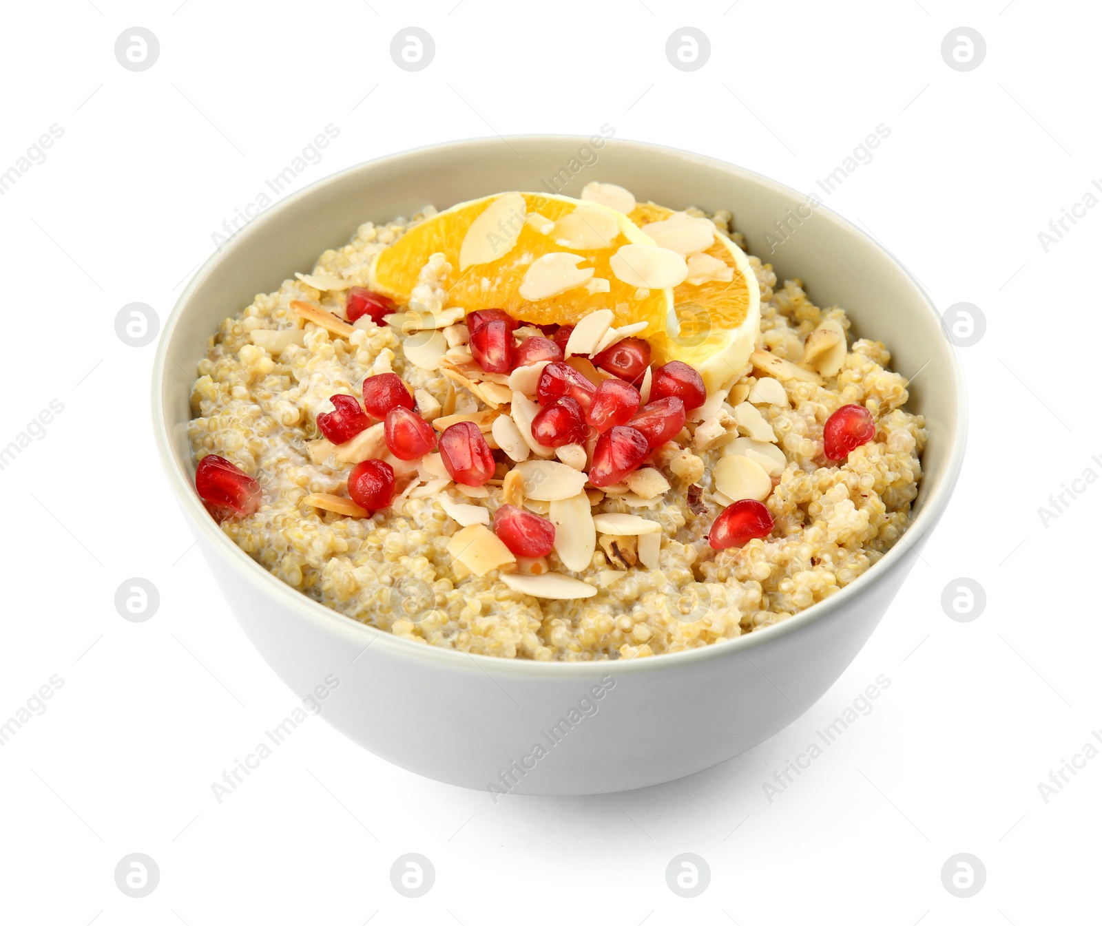 Photo of Bowl of quinoa porridge with nuts, orange and pomegranate seeds on white background