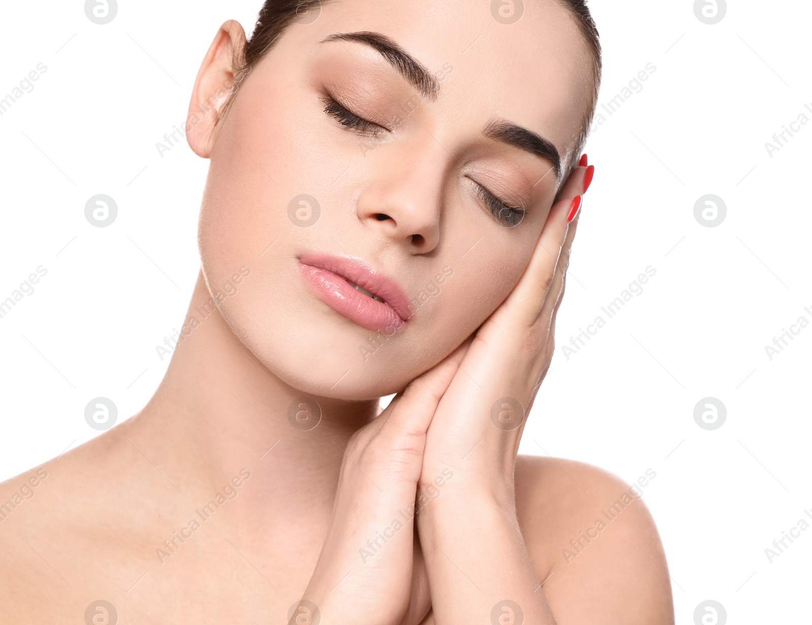 Photo of Portrait of young woman with beautiful face and natural makeup on white background, closeup