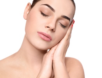 Photo of Portrait of young woman with beautiful face and natural makeup on white background, closeup