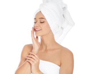 Photo of Portrait of young pretty woman with towels on white background