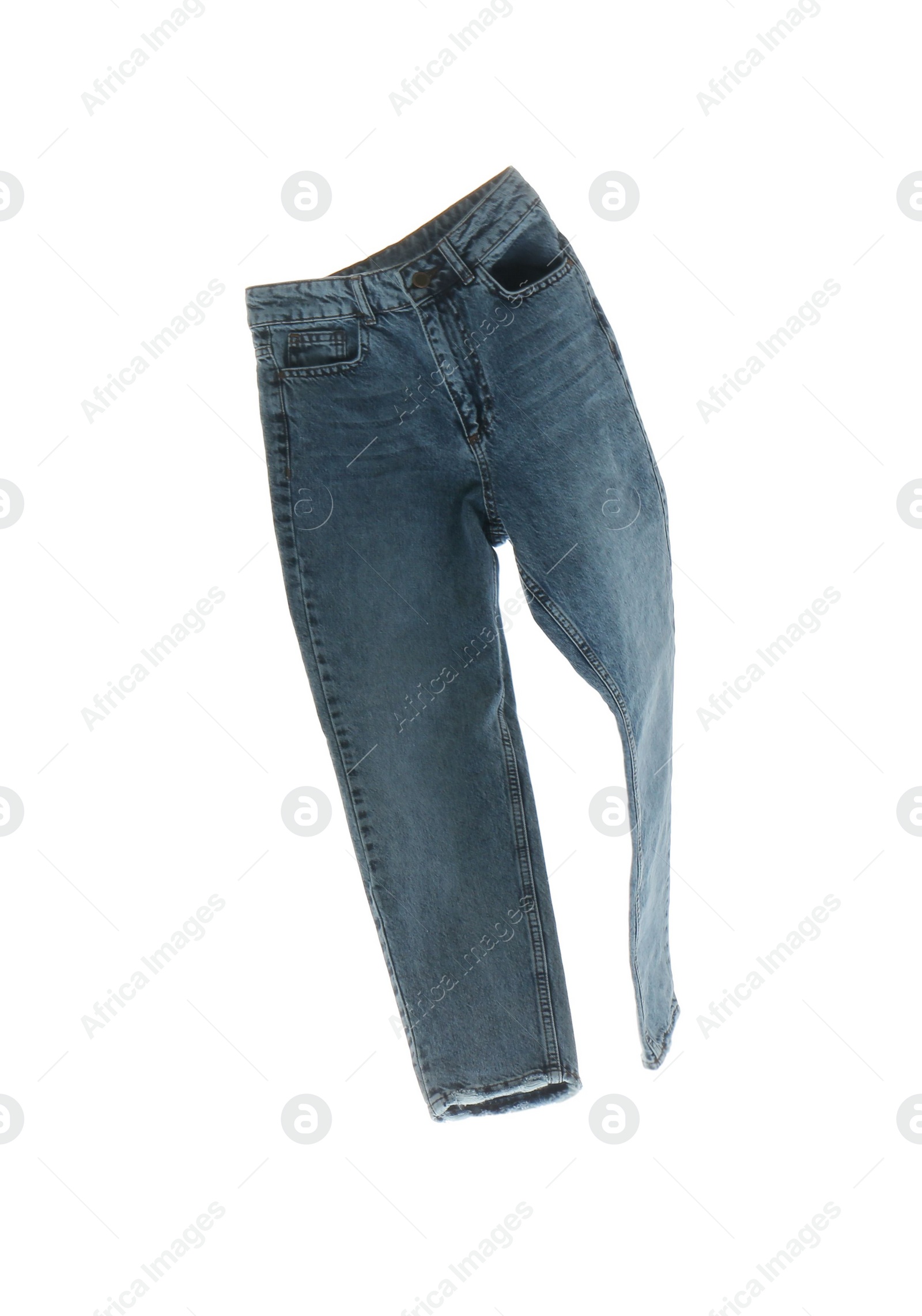 Photo of Blue jeans isolated on white. Stylish clothes