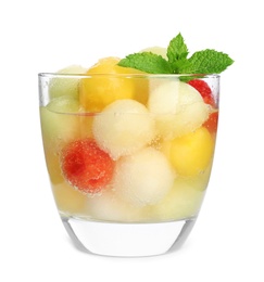 Glass of melon and watermelon ball cocktail with mint on white background