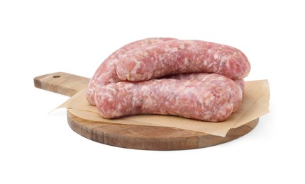 Photo of Wooden board with raw homemade sausages isolated on white
