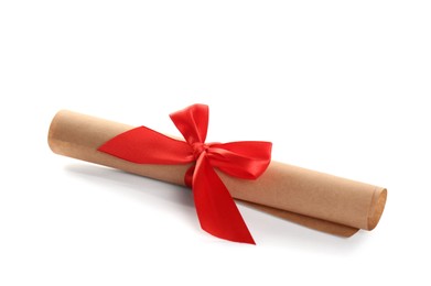 Photo of Rolled student's diploma with red ribbon isolated on white