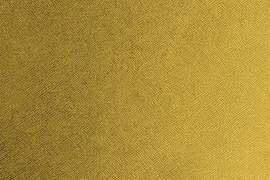 Image of Golden textured surface as background, closeup view