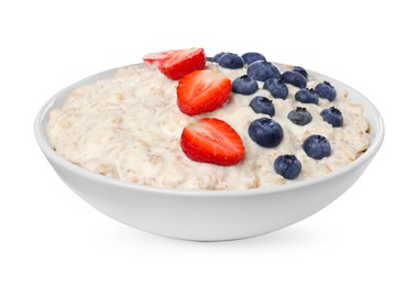 Photo of Tasty boiled oatmeal with berries in bowl isolated on white