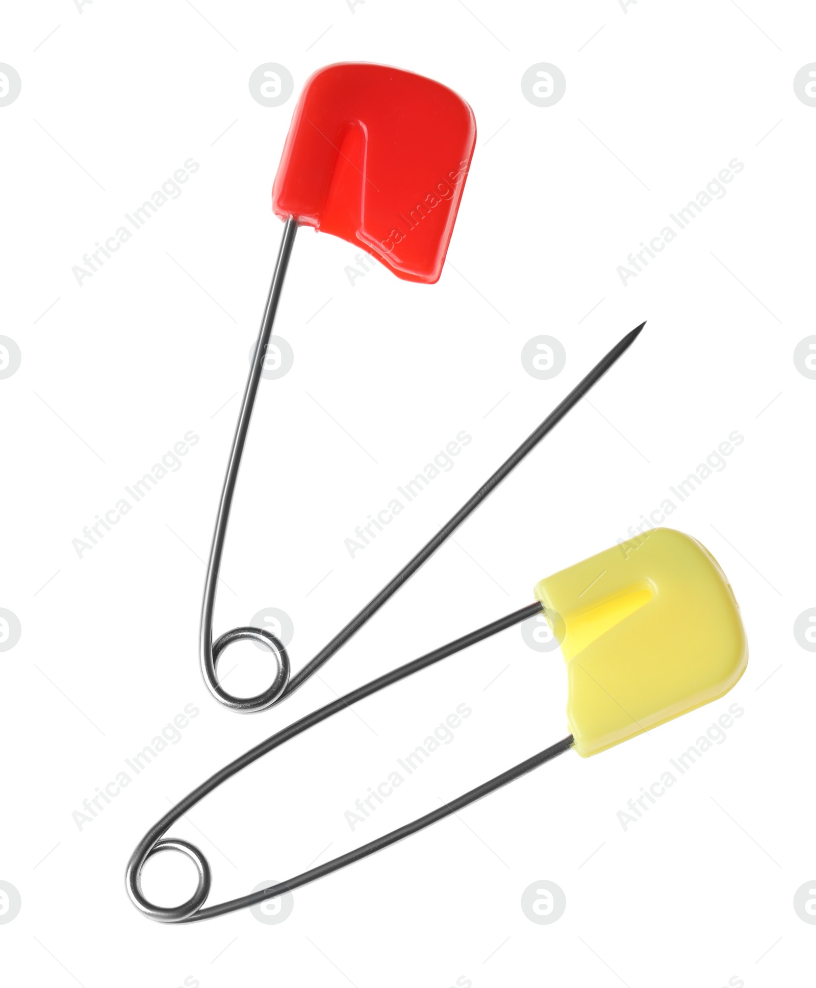 Photo of New colorful safety pins on white background