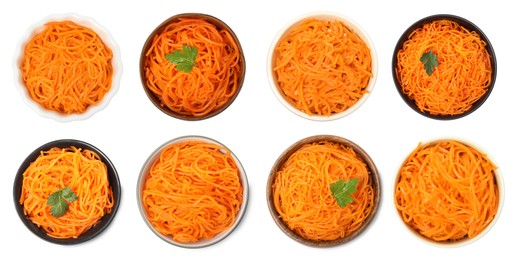 Image of Set with tasty Korean carrot salad on white background, top view. Banner design