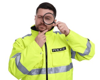 Thoughtful policeman looking through magnifier glass on white background