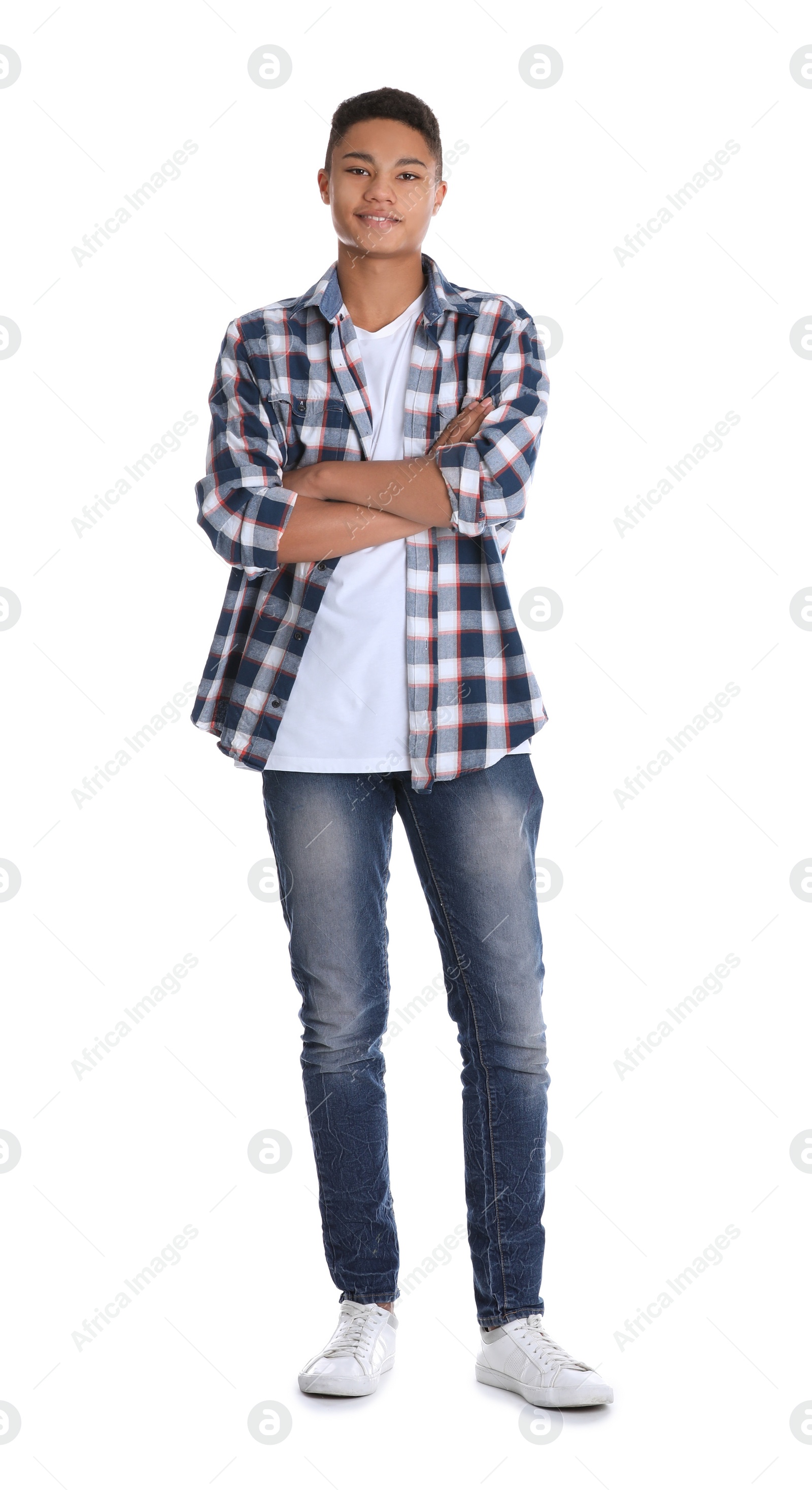 Photo of Portrait of African-American teenage boy on white background