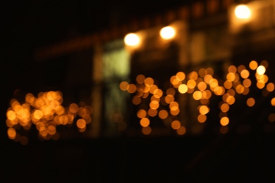 Photo of Beautiful street lights at night. Bokeh effect