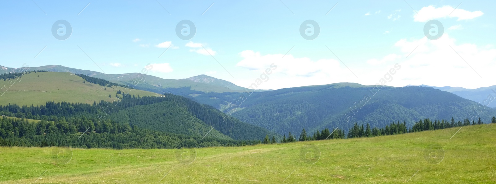 Image of Picturesque mountains on sunny day, banner design