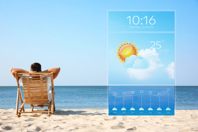 Image of Young man relaxing in deck chair on sandy beach and weather forecast widget. Mobile application