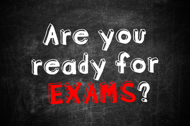 Black chalkboard with phrase ARE YOU READY FOR EXAMS as background