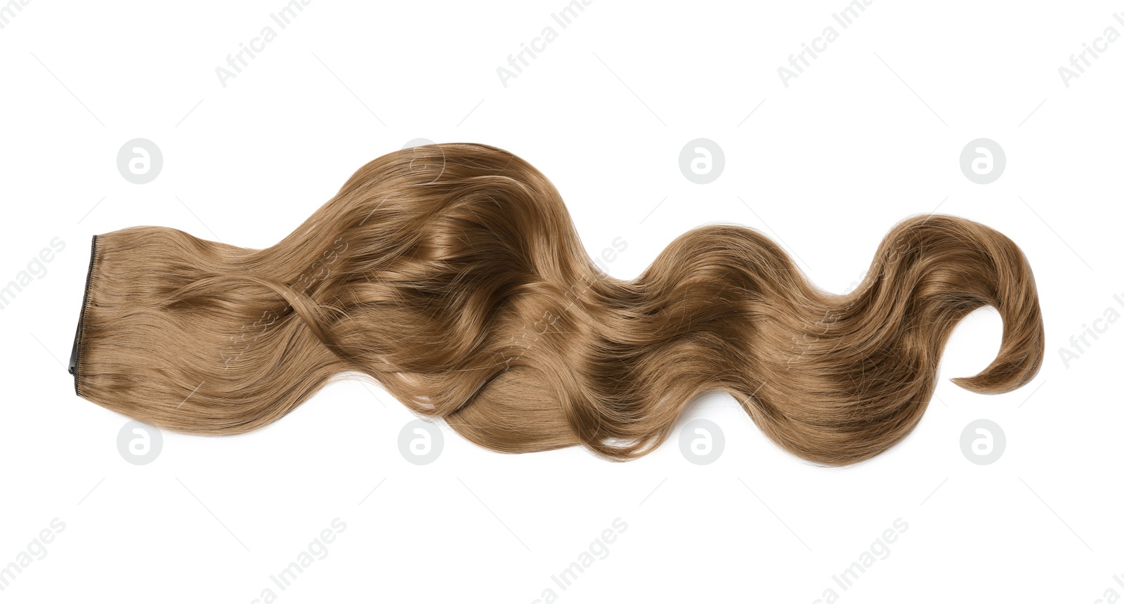 Photo of Lock of brown wavy hair on white background, top view