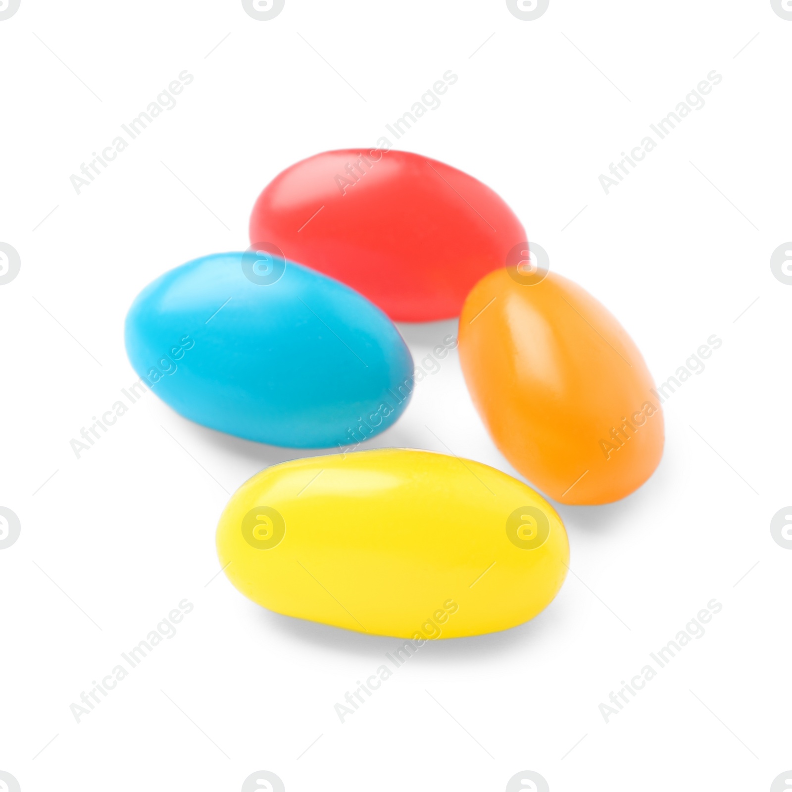 Photo of Tasty bright jelly beans isolated on white